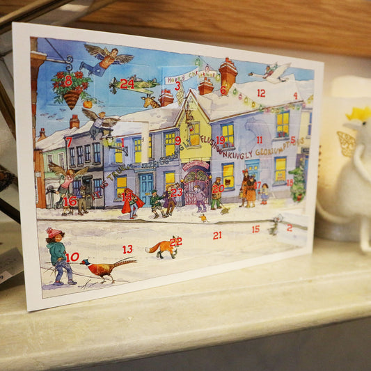 Christmas advent calendar with illustration of the Roald Dahl Museum and Story Centre winter scene